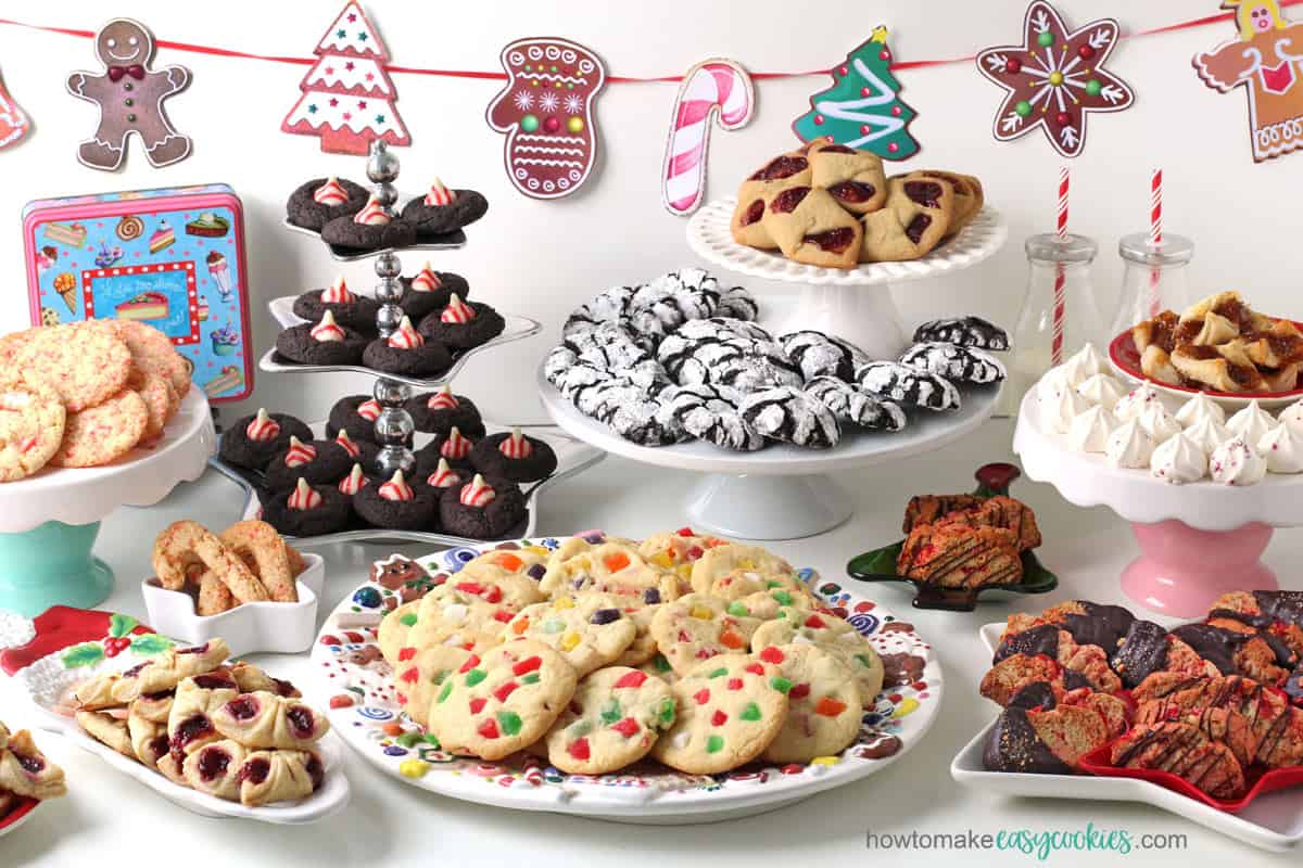 Christmas cookies including gumdrop cookies, chocolate crinkles, biscotti, kiss cookies, and more.