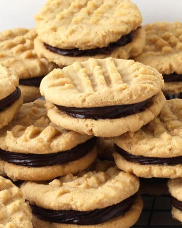 Peanut butter sandwich cookies filled with decadently rich and creamy chocolate ganache.