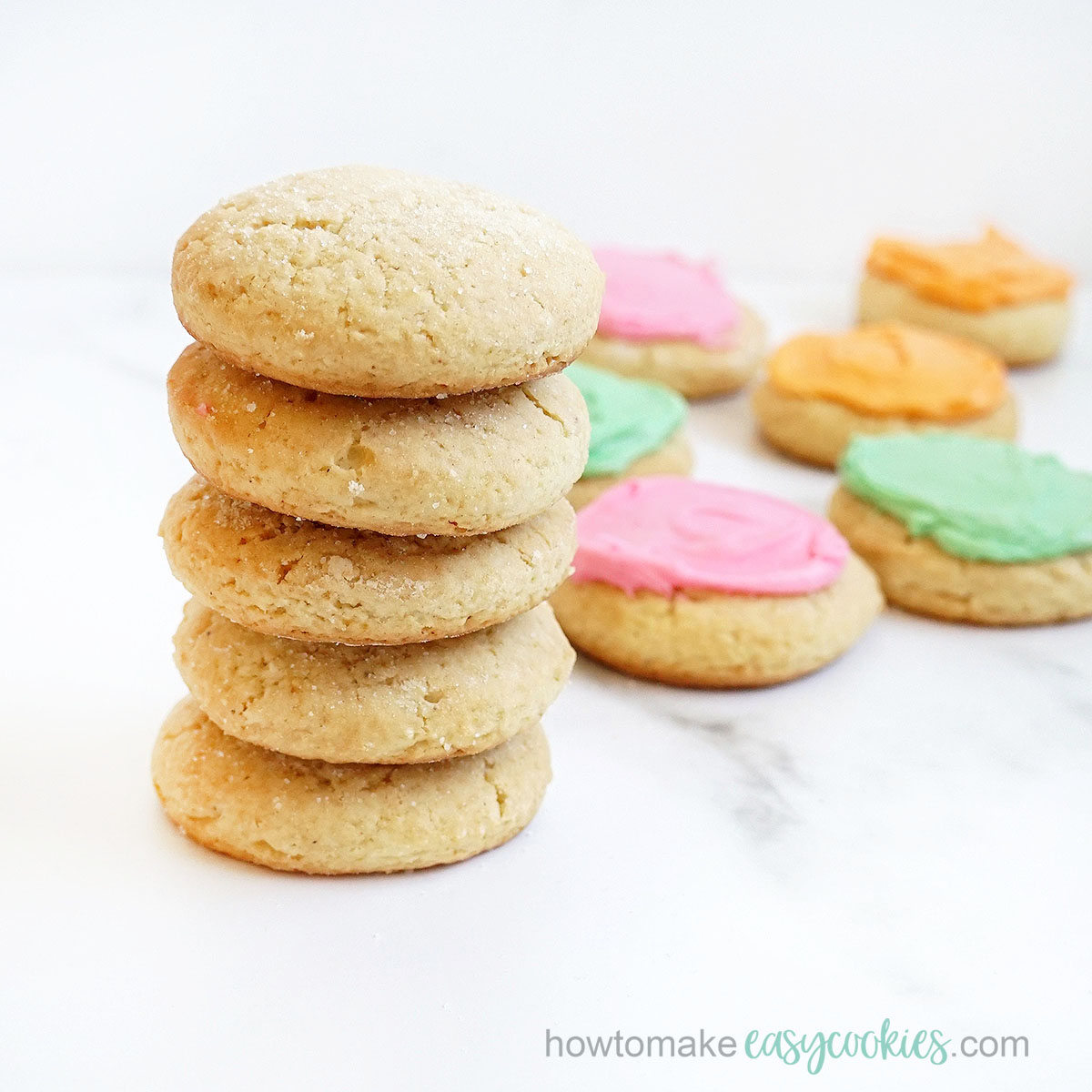 stacked sour cream cookies with buttercream frosting 
