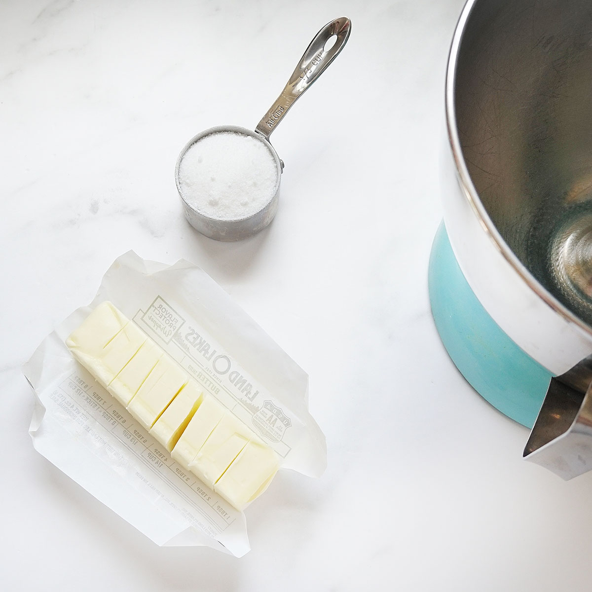 butter and sugar with standing mixer 