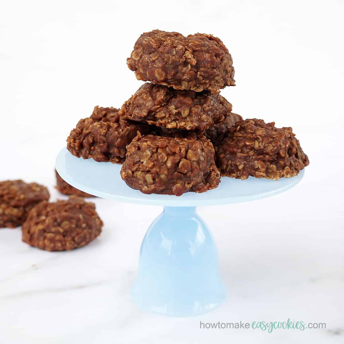 no bake chocolate peanut butter oat cookies on cake stand 