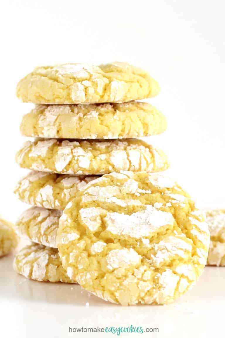 lemon cake mix cookies crackled with powdered sugar on top
