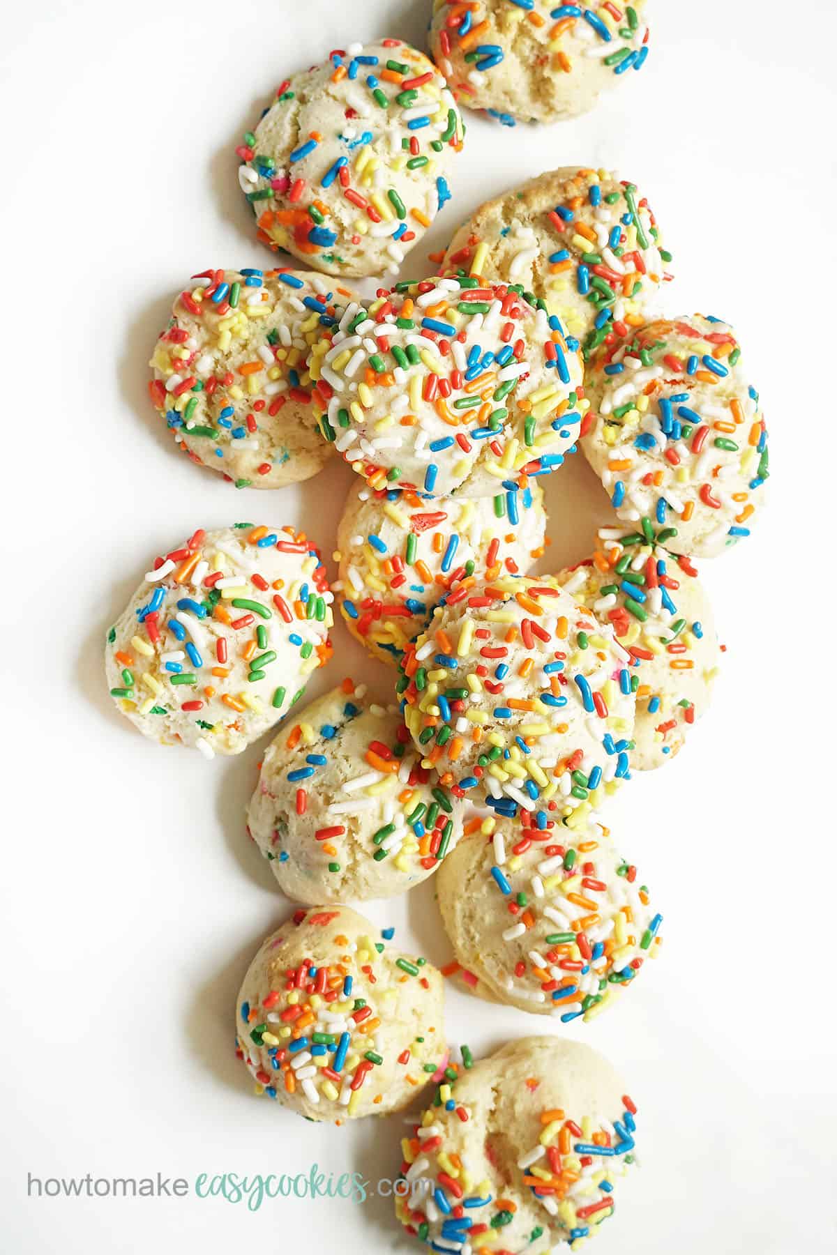 overhead view of stacked Funfetti cake mix cookies with sprinkles