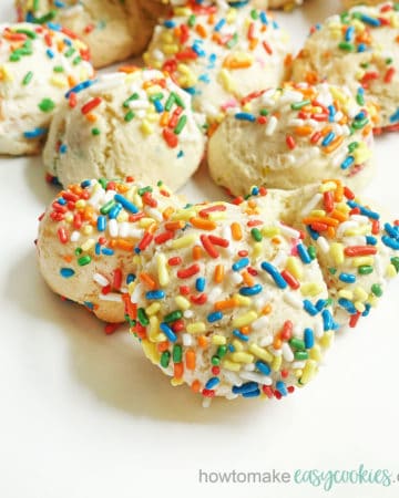 close up of stacked Funfetti cake mix cookies with rainbow sprinkles