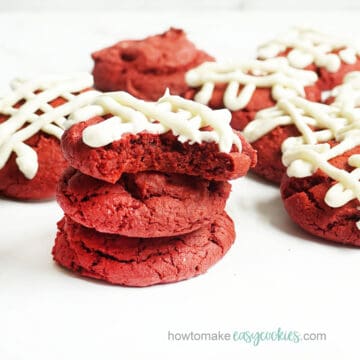 red velvet cookies with cake mix topped with cream cheese frosting