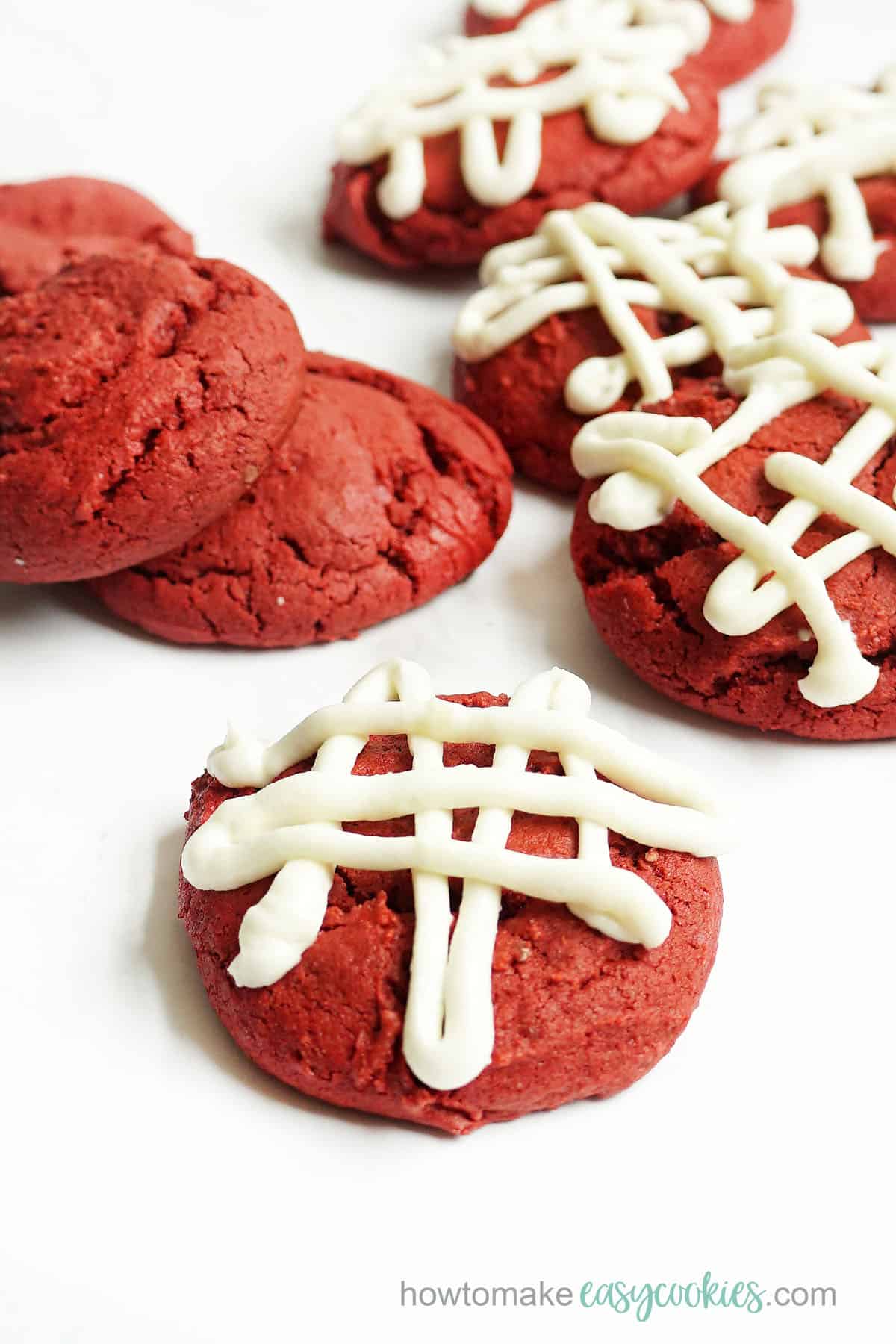 cake mix cookies with red velvet and frosting