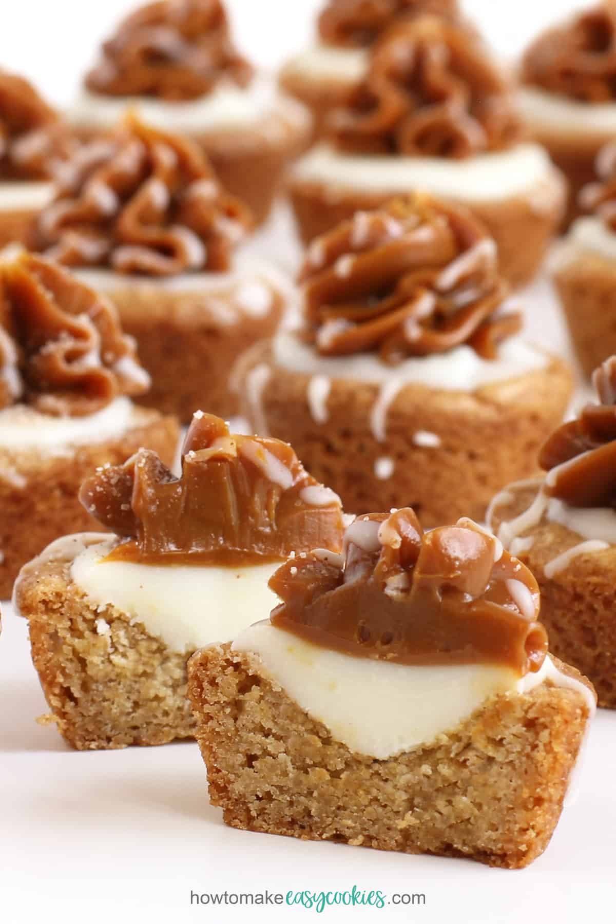 cinnamon snickerdoodle cookie cups with white chocolate ganache and dulce de leche caramel