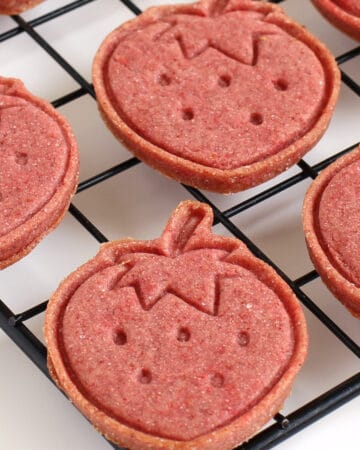 strawberry cookies cut out with a strawberry cookie cutter and stamp