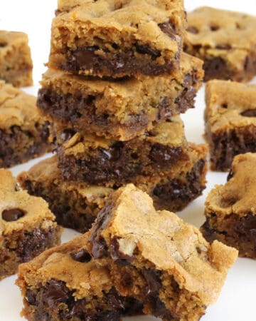 warm chocolate chip cookie bars right out of the oven have gooey melted chips inside
