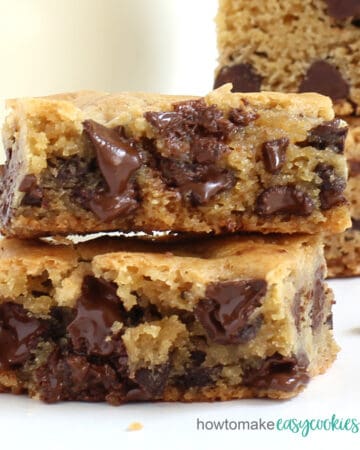 broken chocolate chip cookie bar showing melted chocolate chips inside