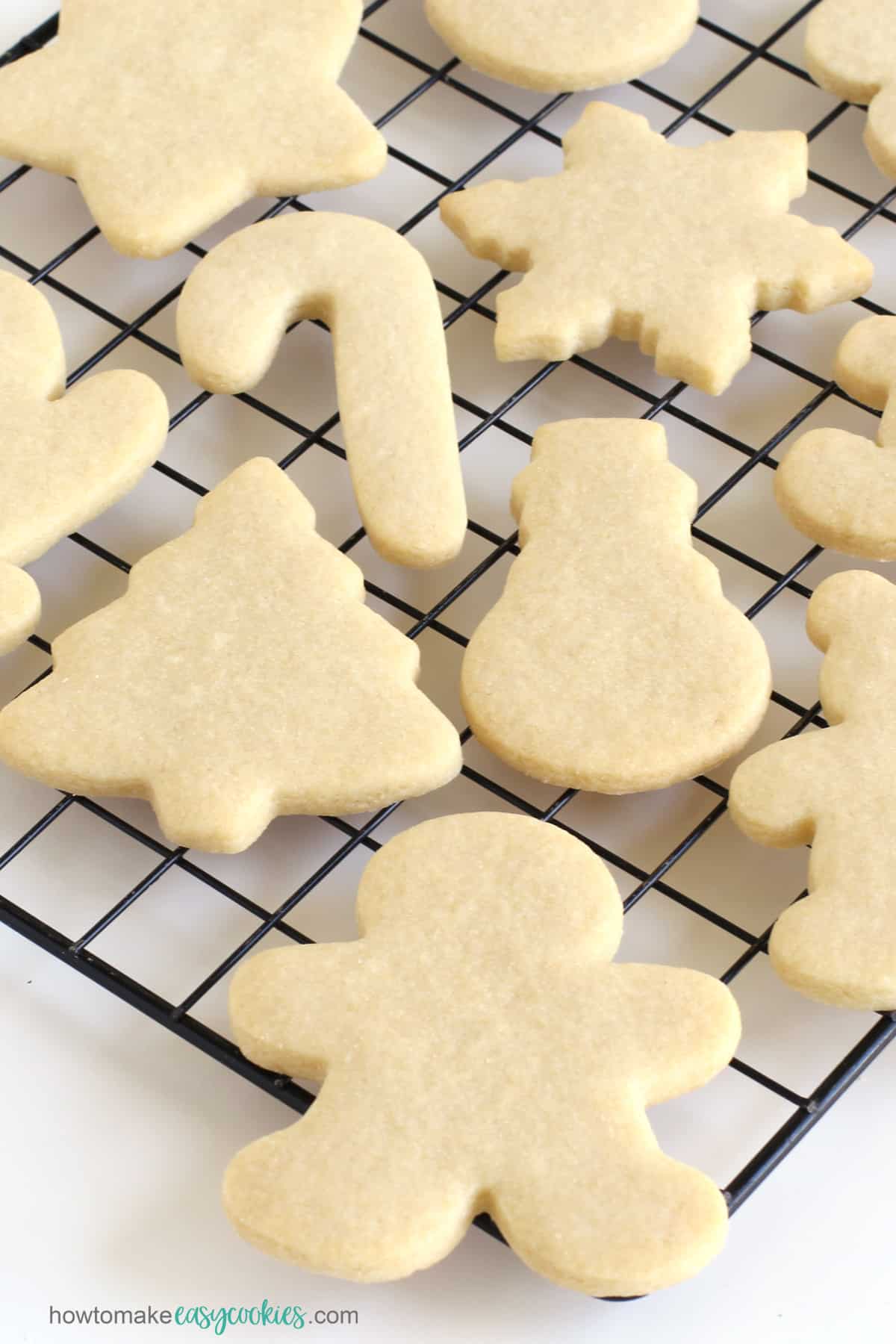 no-spread cut-out Christmas cookies on a cooling rack