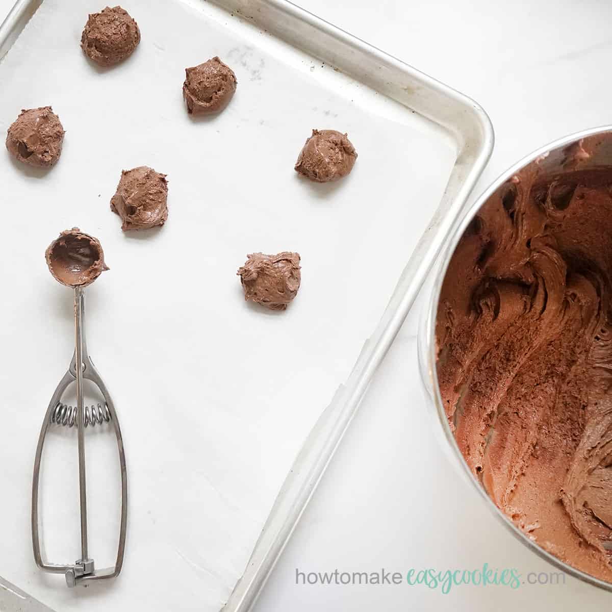 scooping chocolate cake mix cookies