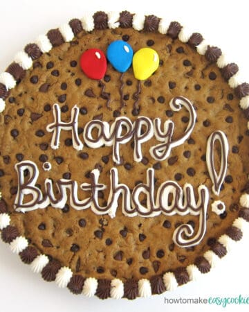 Happy birthday cookie cake filled with chocolate chips.