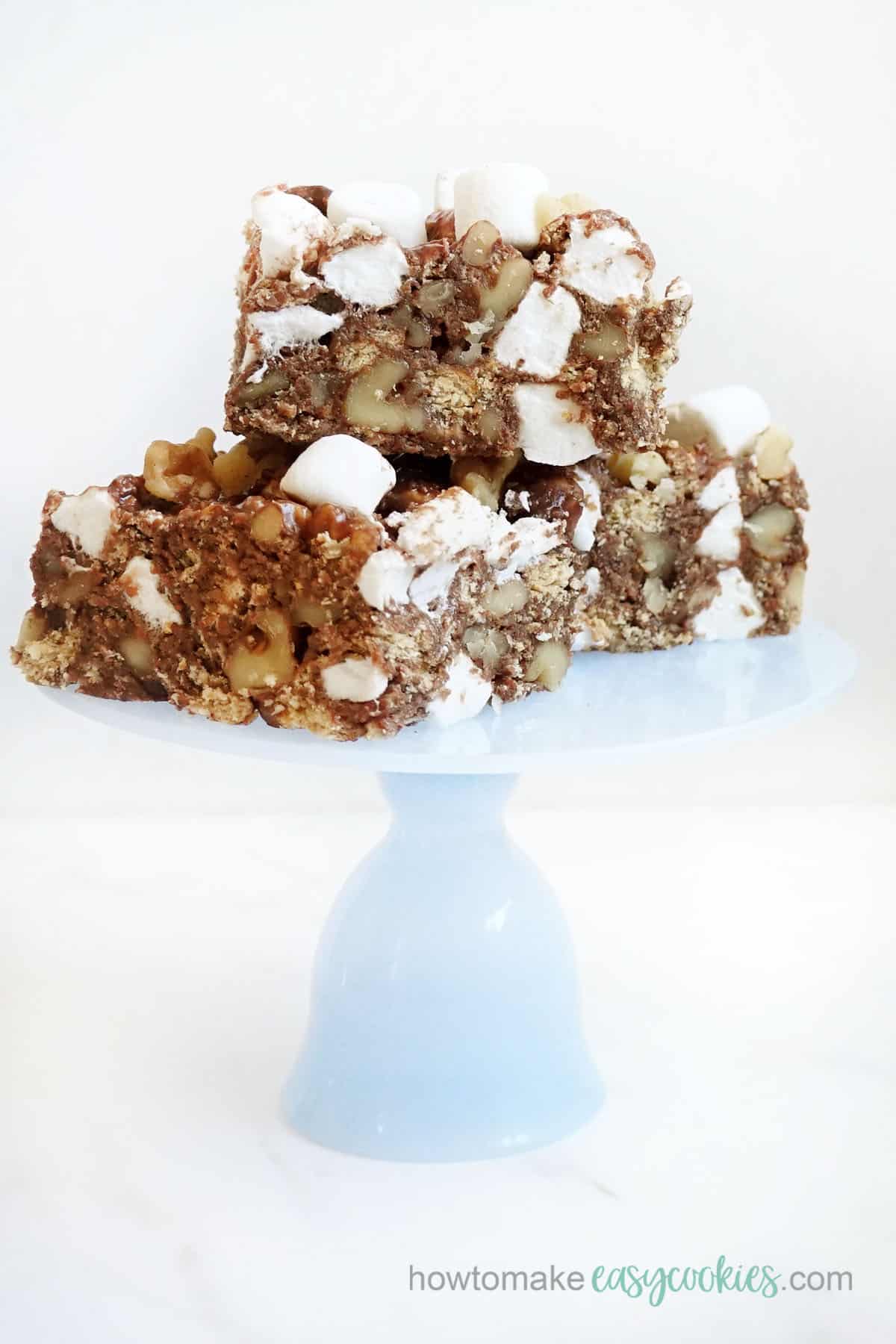 Rocky Road bars or no-bake s'mores bars on cake stand