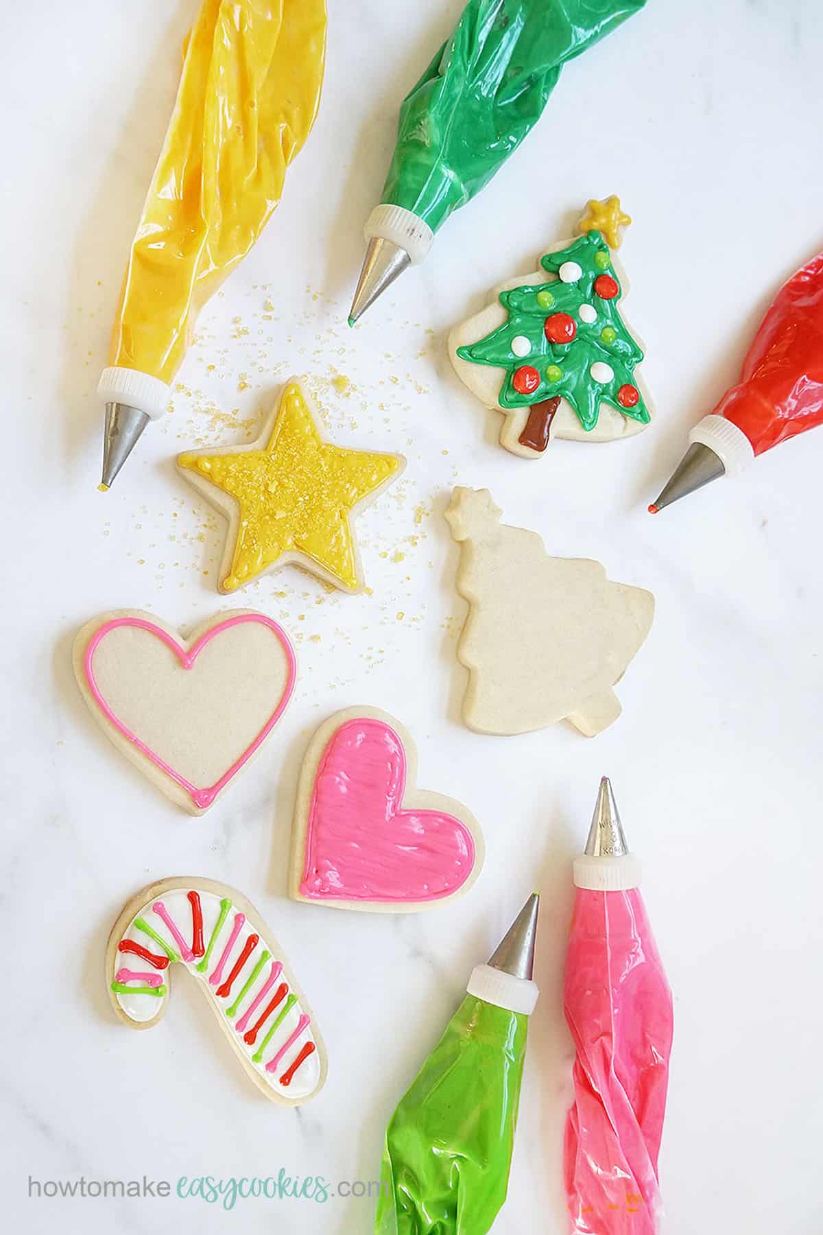 decorating cut-out sugar cookies for Christmas