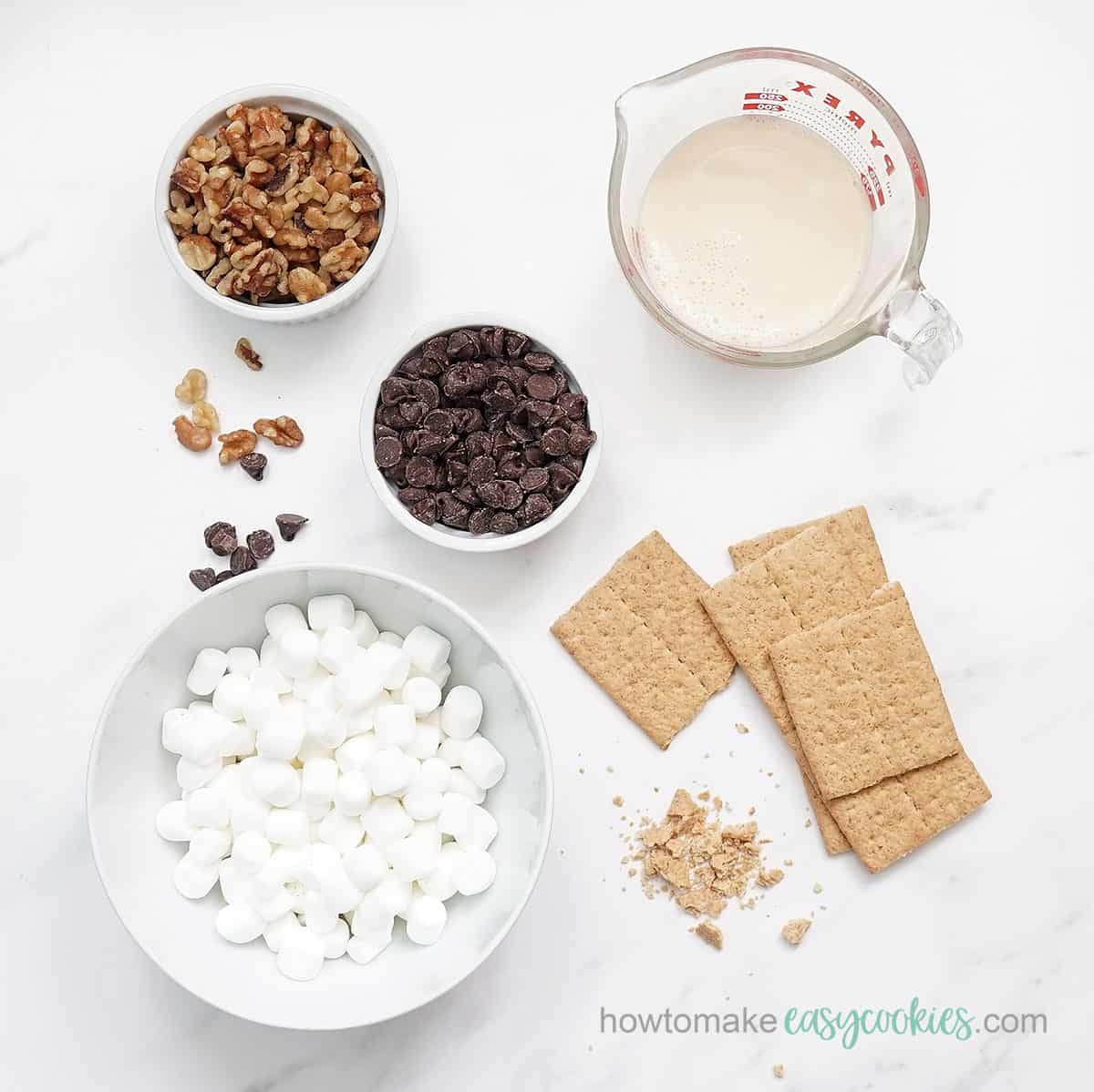 s'mores bar Rocky Road ingredients, graham crackers, milk, chocolate chips, mini marshmallows, chopped walnuts 