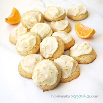 orange drop cookies topped with orange frosting