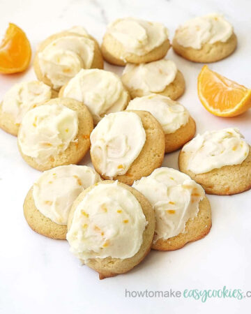orange drop cookies topped with orange frosting