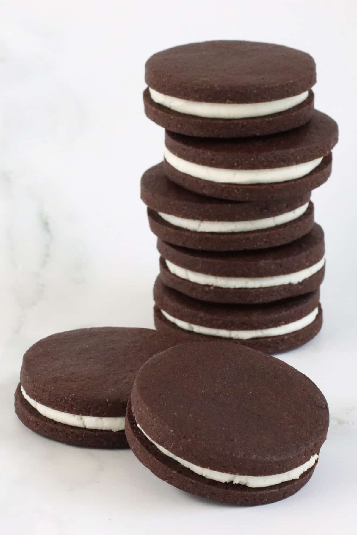 homemade oreos with round chocolate sandwich cookies filled with vanilla cream