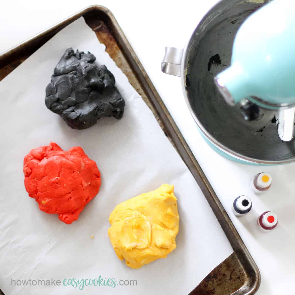 coloring cookie dough red, black, and yellow