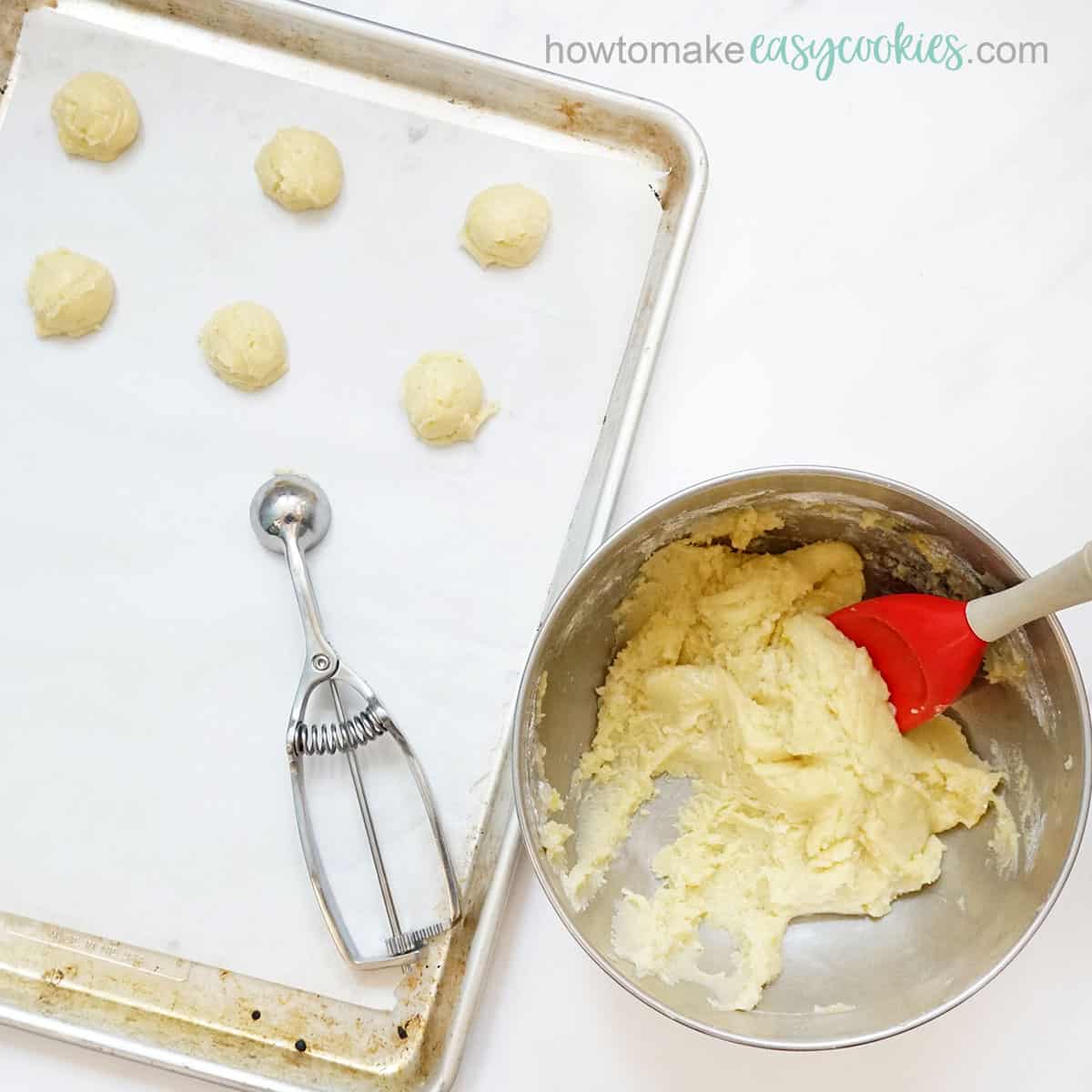 how to make cookies from white cake mix -- dough scooped on baking tray