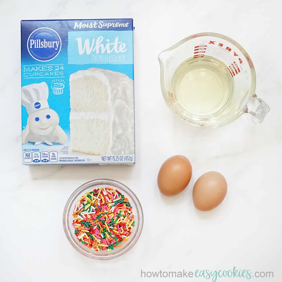 boxed white cake mix, eggs, vegetable oil, rainbow jimmies
