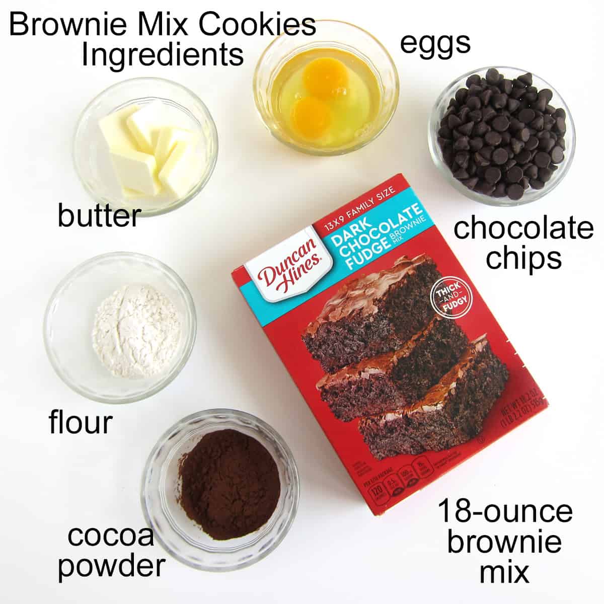 Brownie Mix Cookie Ingredients including brownie mix, cocoa powder, flour, butter eggs, and chocolate chips.
