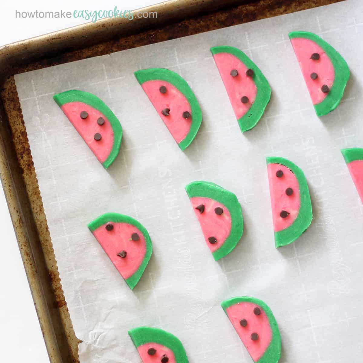 watermelon slice cookies on baking tray